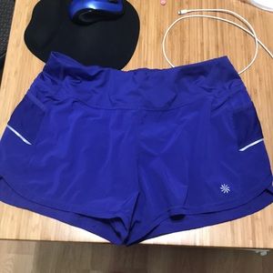 Athleta blue running shorts with lining